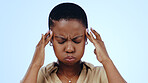 Woman, headache and hands on temple in studio or stress or vertigo dizzy, anxiety on blue background. Black person, brain fog as migraine fear or tired crisis or frustrated problem, burnout as mockup