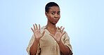 Black woman, portrait and hands for no, rejection or refusal isolated against a blue studio background. Face of worried African female person or model in stop, halt or not interested on mockup space