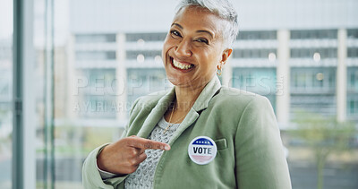 Buy stock photo Woman, vote and portrait for politics, pointing and badge for support, government and member. Elections, voter choice and representative for democracy, registration and sticker for voting register
