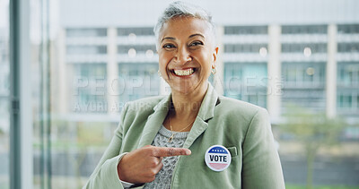 Buy stock photo Woman, vote and portrait for democracy, pointing and badge for support, government and member. Elections, voter choice and representative for politics, registration and sticker for voting register