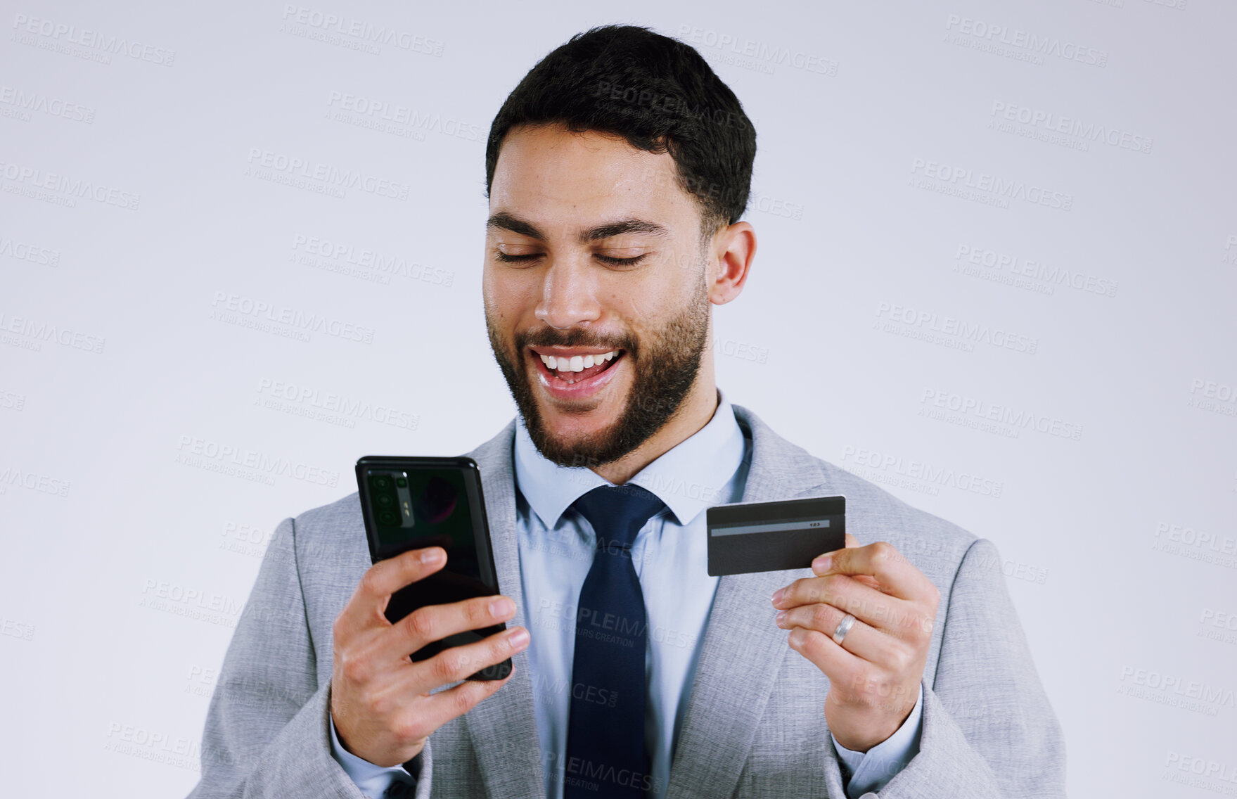 Buy stock photo Business man, credit card and phone for online shopping, e commerce or digital payment in studio. Professional worker typing on his mobile for internet banking or debit isolated on a white background