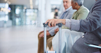 Buy stock photo Hand, suitcase and a business person in the airport for travel, waiting to board his international flight. Corporate, luggage and a professional employee in a terminal or lobby for a global trip