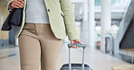 Closeup, airport travel and woman with suitcase, walking and business trip with holiday, journey and getaway. Person, employee and traveller with luggage, movement and flight with weekend break