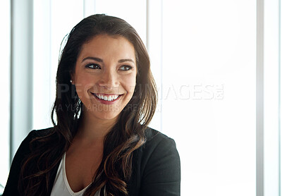 Buy stock photo Shot of a smiling businesswoman posing in an airport terminal