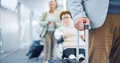 Hand, luggage and a business person in an airport for travel, waiting in line for boarding a flight closeup. Gate, terminal and a corporate employee with a suitcase for luggage on a trip or journey