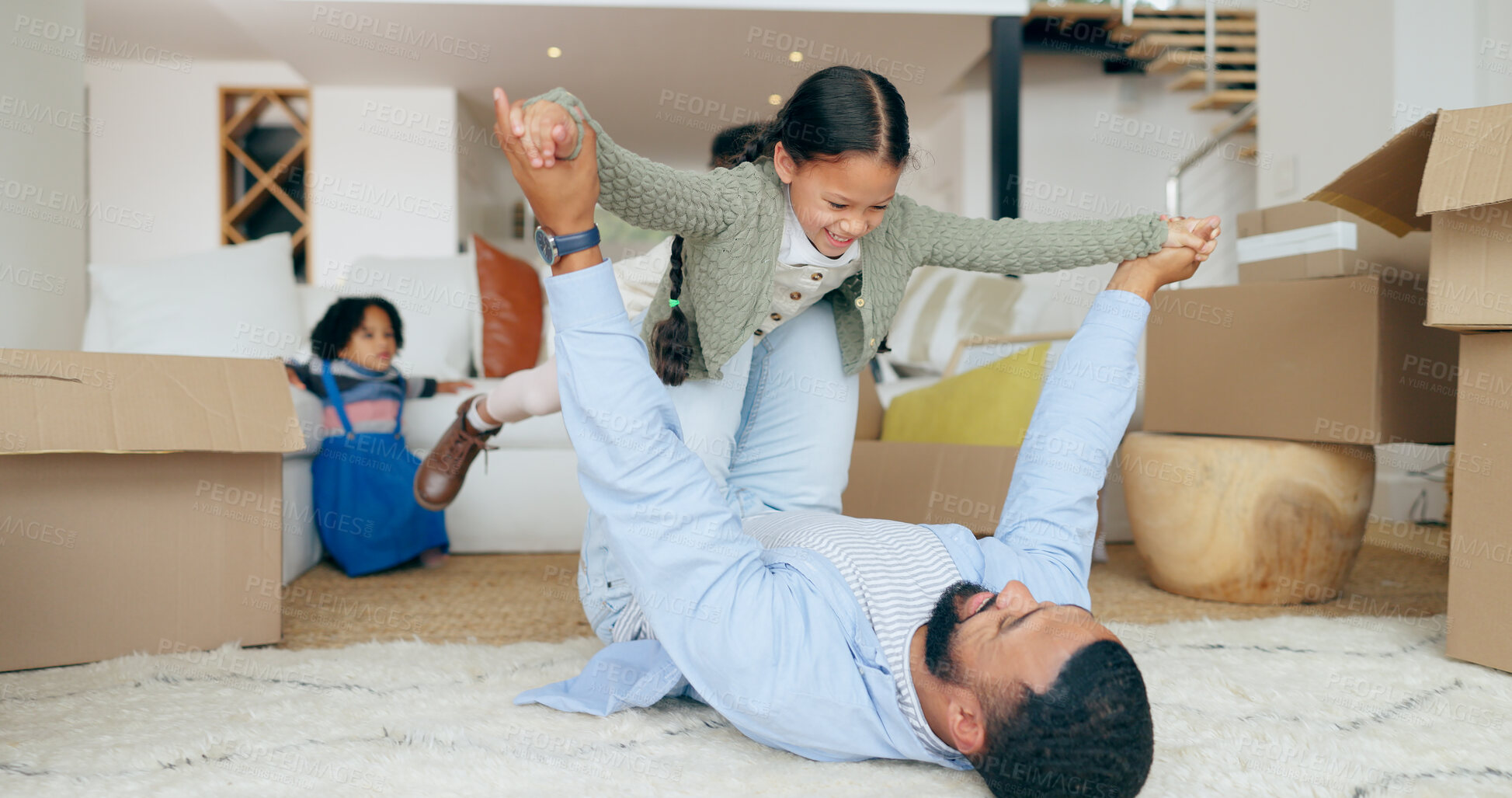 Buy stock photo Father, daughter and airplane or play in new home with happy, fun and bonding for relocation in hallway. Family, man and girl kid or lifting in knees for game or freedom in real estate or apartment