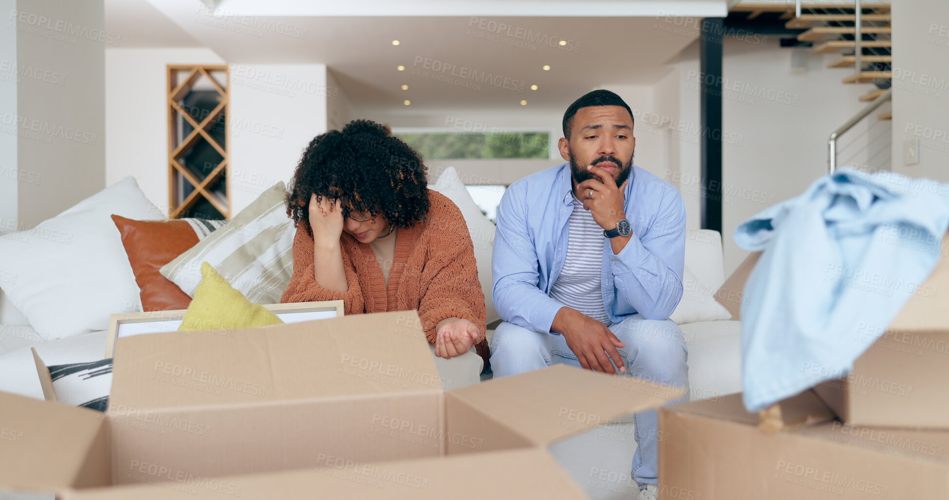Buy stock photo New home, box and frustrated couple for moving, property investment and renting house. Conflict, argue and man and woman with crisis, problem and fight for mortgage, apartment or real estate purchase