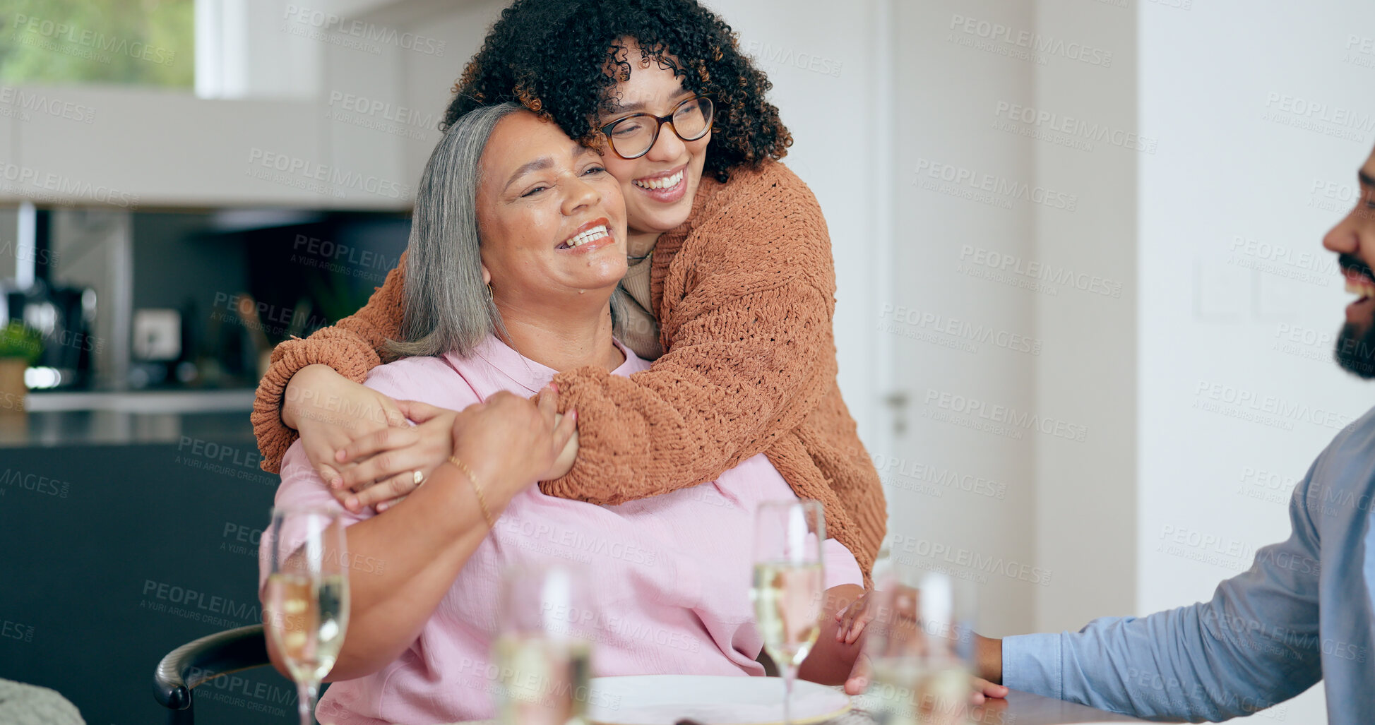 Buy stock photo Senior, woman or daughter with hug for love, laugh or joke in dining room of house with happy. Family, mother and person with embrace, smile and care for relaxing, peace and comic in lounge of home