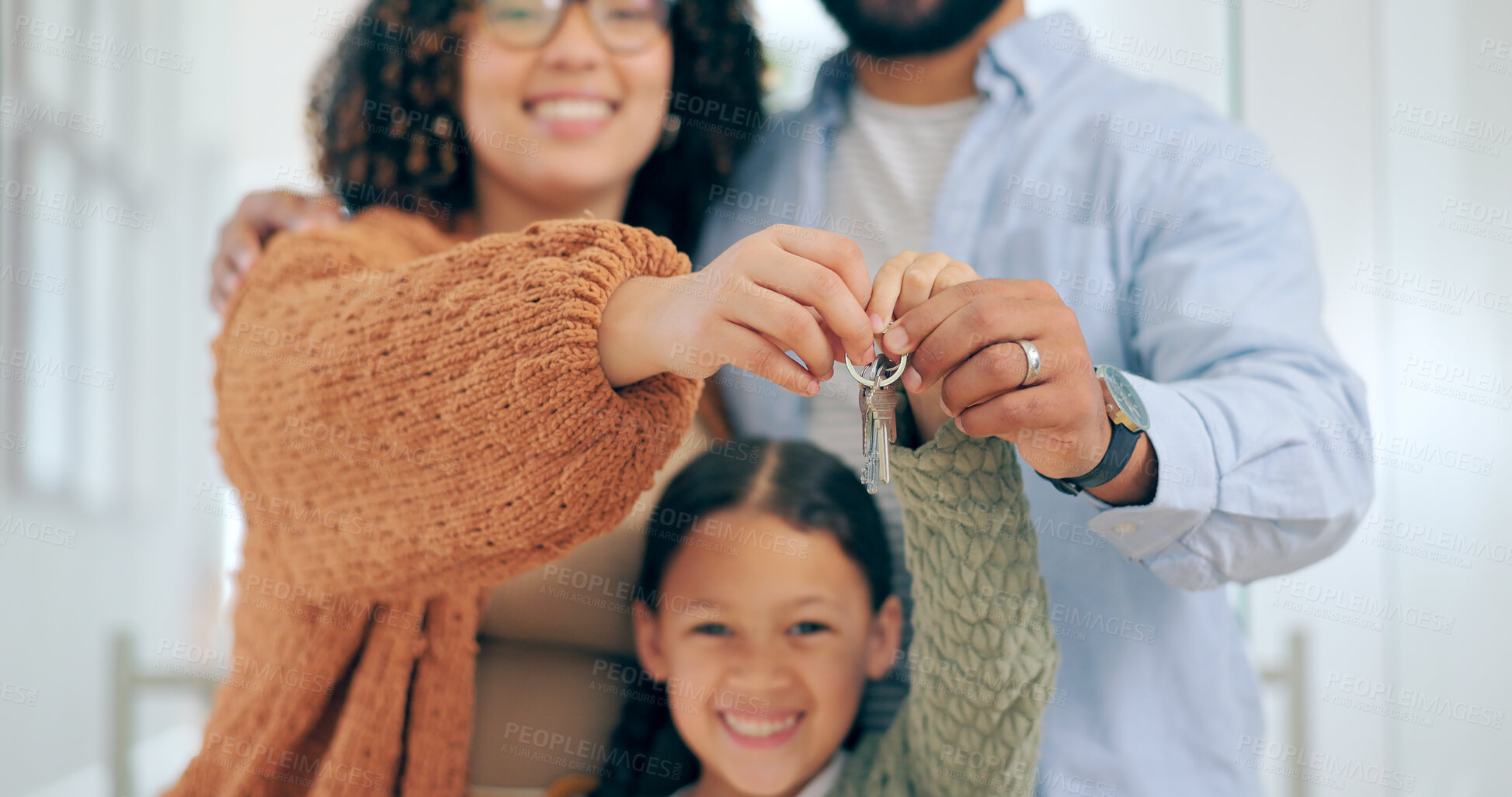Buy stock photo New home, keys and portrait of parents and child excited for house, property investment and moving. Family, happy and mother, father and young girl for mortgage, rental and real estate purchase