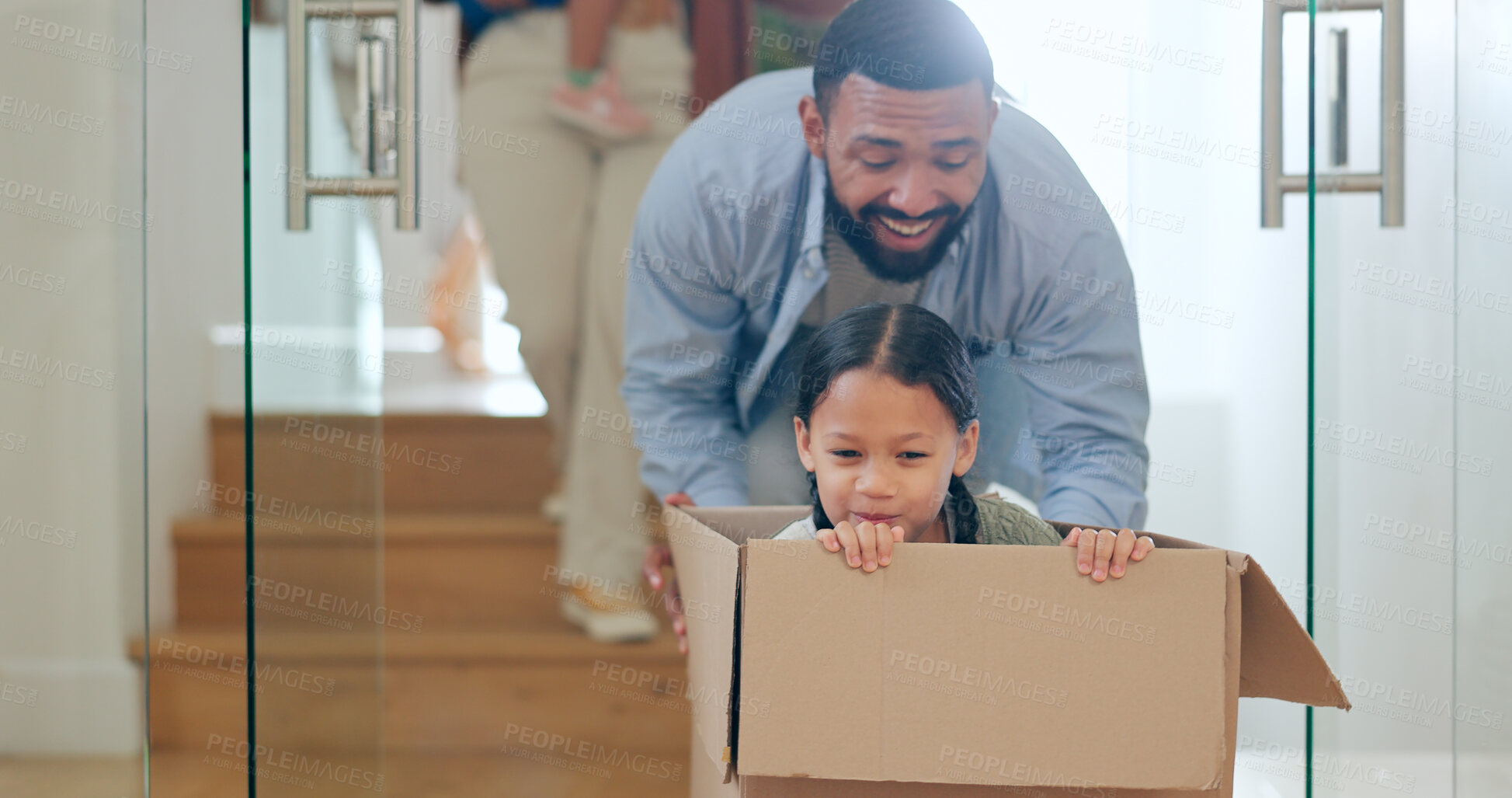 Buy stock photo Dad with child in box, moving and playing in new home with property mortgage, future opportunity and fun. Games, happy father and playful daughter together in apartment, real estate and cardboard.
