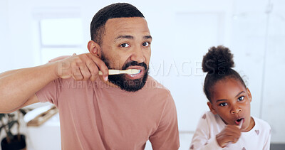 Buy stock photo Dad, child and brushing teeth in morning routine, portrait and playful in bathroom, hygiene and wellness. Dental care, oral health and toothbrush with toothpaste for gum disease, cleaning and girl