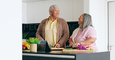 Buy stock photo Senior, couple and cooking in kitchen with smile for dinner, lunch or vegetables with support, help and love. Elderly, man and woman with happiness, peace and nutrition for bonding or relationship