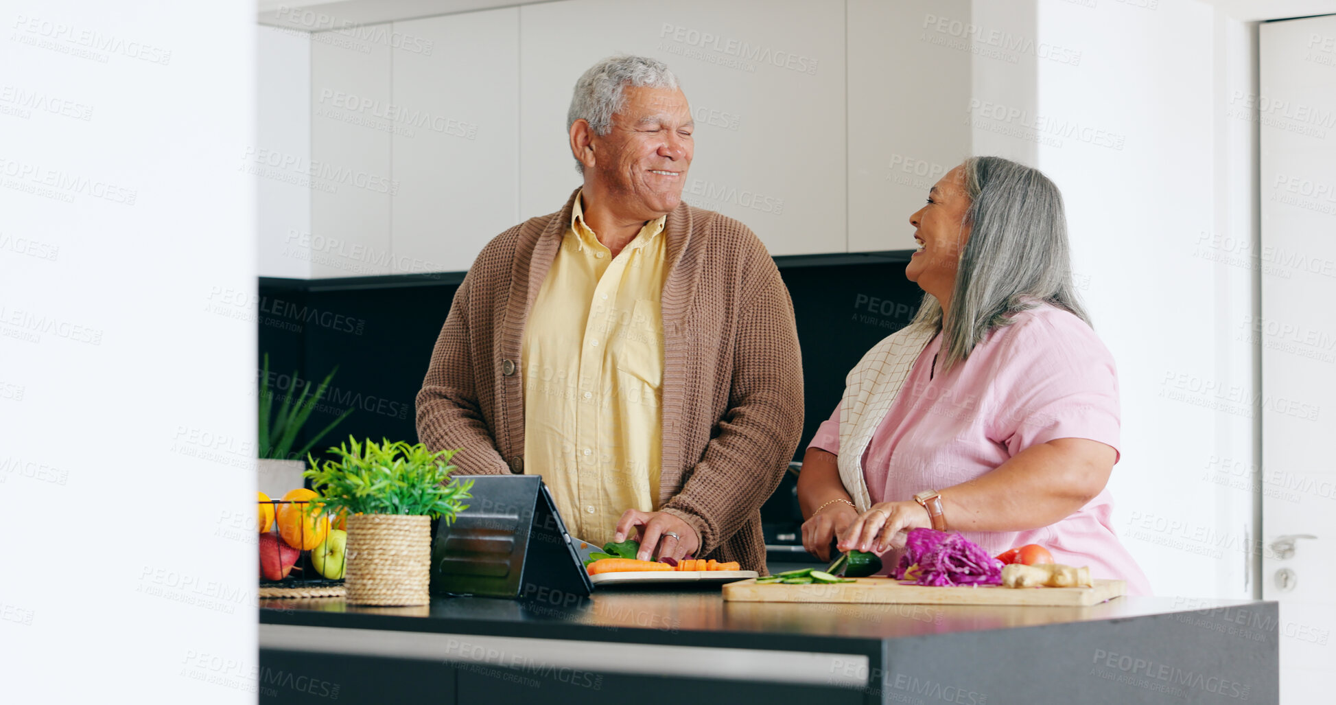 Buy stock photo Senior, couple and cooking in kitchen with smile for dinner, lunch or vegetables with support, help and love. Elderly, man and woman with happiness, peace and nutrition for bonding or relationship