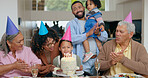 Birthday cake, children and family with grandparents for celebration, party and singing, clapping and love. Happy interracial people, mother and father or kids make wish with holiday candles at home