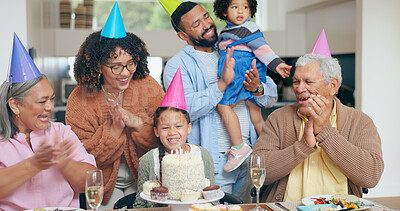 Birthday cake, kids and family with grandparents for celebration, party and singing or clapping with love. Happy interracial mother, father and girl for congratulations or holiday dessert at home