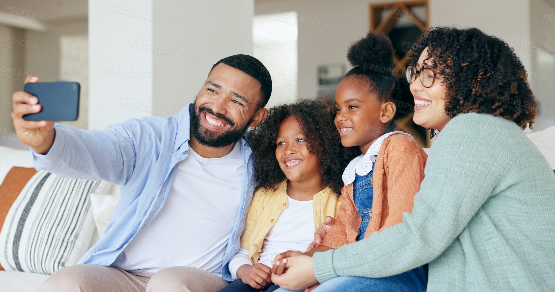 Buy stock photo Family in fun selfie with kids on sofa, bonding together for love and memory in home. Photography, happy face and parents with girl children in living room with smile, relax with mother and father.