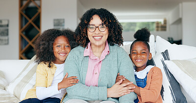 Buy stock photo Happy family, portrait of mom and kids in home, bonding together for love or memory on sofa. Support, trust and face of woman with girl children in living room with smile, relax with mother in house.