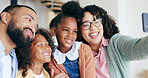 Family in funny selfie with happy kids in house, bonding together for love and memory in home. Photography, crazy face and parents with children in living room with smile, relax with mom and dad.