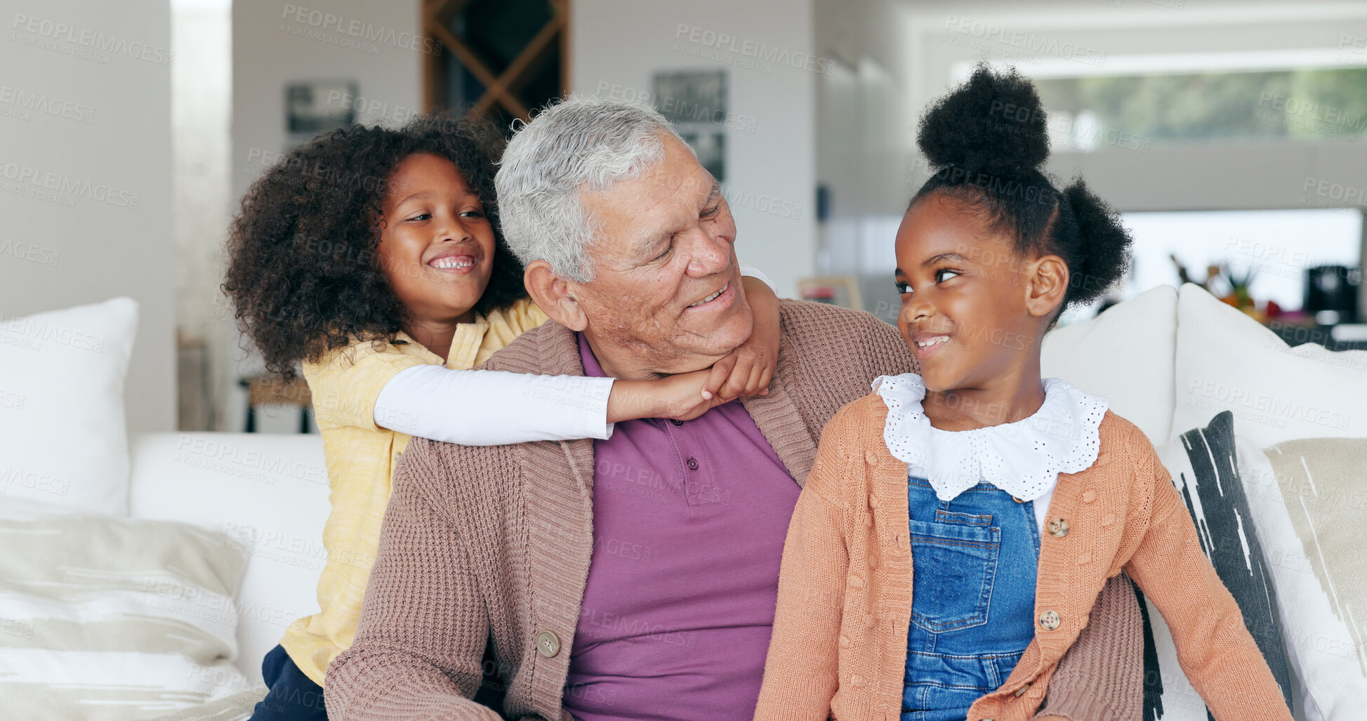 Buy stock photo Happy, hug and grandfather on sofa with children for bonding, relationship and relax at home. Family, love and young girls embrace grandpa for trust, care and affection in living room on weekend