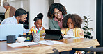 Parents, children and e learning with tablet, laptop and support for education, development and study at desk. Mother, father and kids with computer, online course and home school in family house