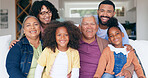 Big family in portrait with kids on sofa, bonding together for love and memory in home. Face of grandparents, parents and children on couch in living room with smile, relax with happiness and smile.