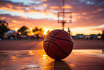 Basketball, outdoor and court with ball on floor for athletic competition or recreation low angle. Exercise, cardio and basketball court ground with basket board for sports, match or workout.