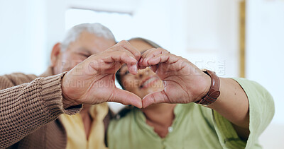 Buy stock photo Care, heart hands or old couple with support, love or hope in a marriage commitment at home together. Happy, valentines day blur or romantic senior man with smile or elderly woman on anniversary 