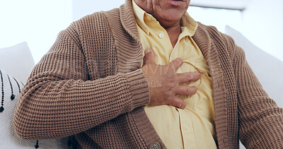 Buy stock photo Closeup, home and old man with heart attack, hands on his chest and heartburn in a lounge. Elderly person, pensioner and senior guy with emergency, wellness and issue with asthma or tuberculosis