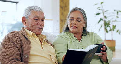 Buy stock photo Senior, couple and bible with coffee for religion, worship and spiritual on sofa in living room of home. Elderly, man and woman with book of God on couch for faith, christian and trust with happiness