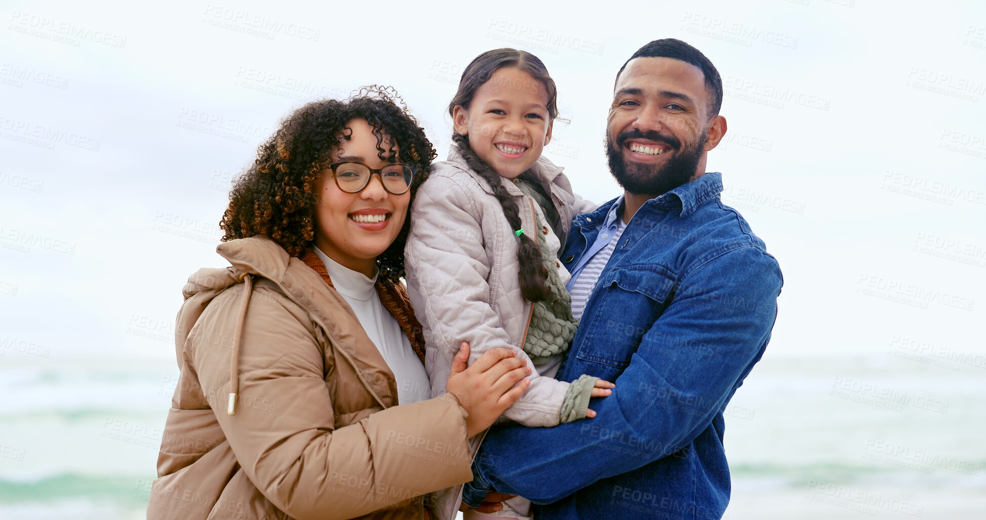 Buy stock photo Happy family, portrait or relax by beach, nature or support love to care on calm holiday. Young man, woman and child with face for bonding, together and vacation in rio de janeiro for health wellness