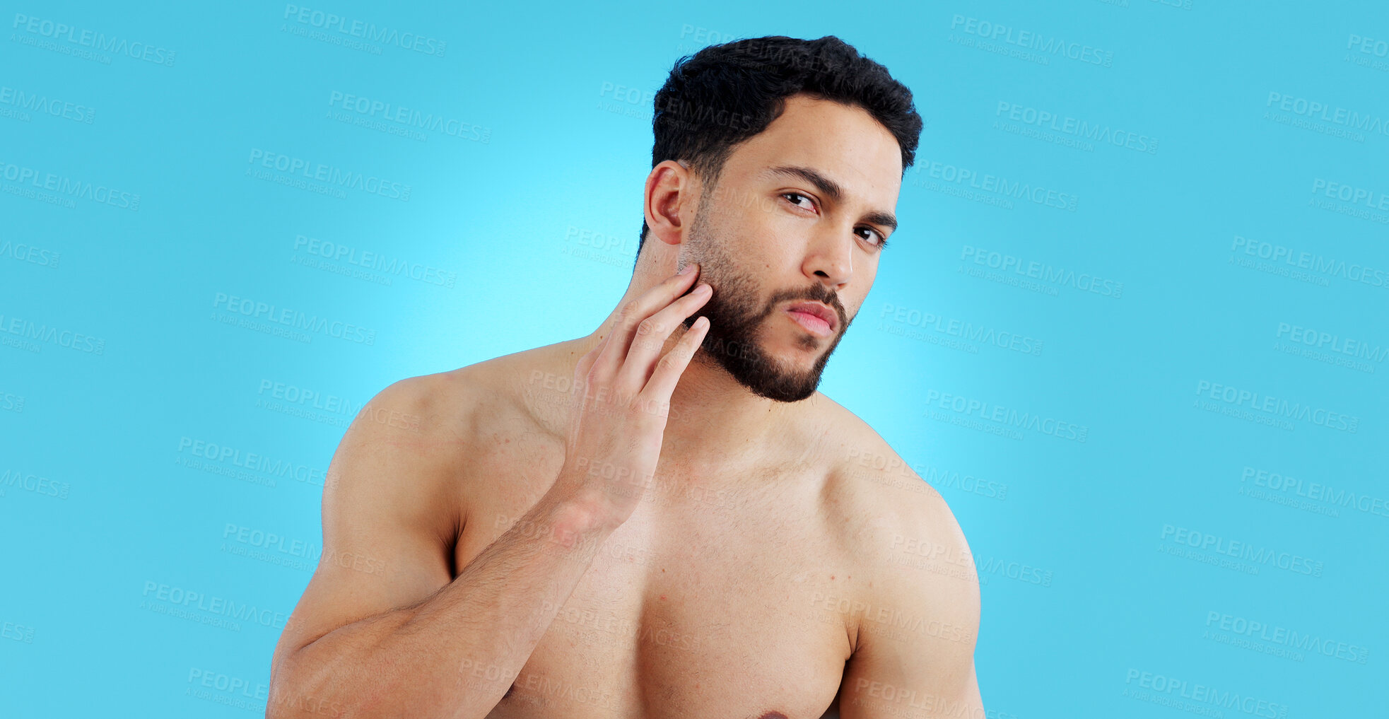 Buy stock photo Man, portrait and beard in grooming, skincare or hygiene isolated against a blue studio background. Face of handsome or attractive male person or model in beauty, facial cleaning or routine on mockup