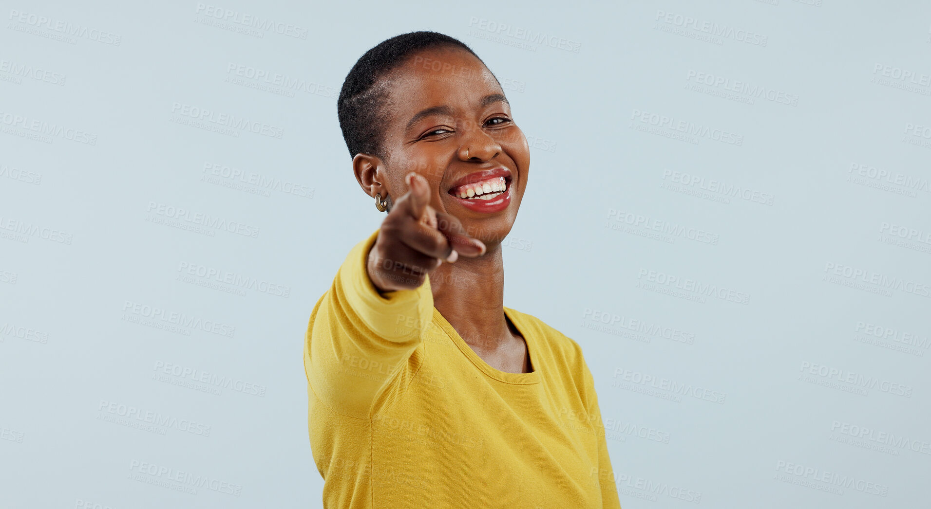 Buy stock photo Happy black woman, portrait and pointing to you for choice or selection against a gray studio background. Face of African female person or model smile with finger for decision, or choosing on mockup