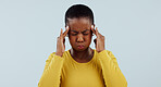 Frustrated black woman, headache and stress in anxiety, burnout or mistake against a gray studio background. African male person with migraine or mental health in pain, pressure or fail on mockup