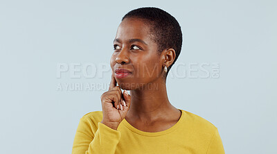 Buy stock photo Happy black woman, face and thinking for solution, planning or brainstorming against a studio background. African female person in wonder, thought or contemplating decision, choice or idea on mockup