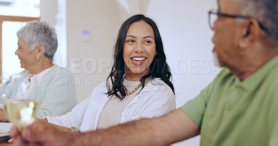 Buy stock photo Happy, family and woman at dinner in home, living room and discussion with grandparents. Senior man, talking and lady smile at funny conversation at celebration, event or lunch together with wine