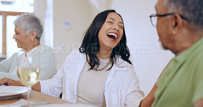 Buy stock photo Happy, woman and laugh with family at dinner in home, living room and joke with grandparents. Senior man, talking and lady smile at comedy or conversation at celebration, event or lunch together