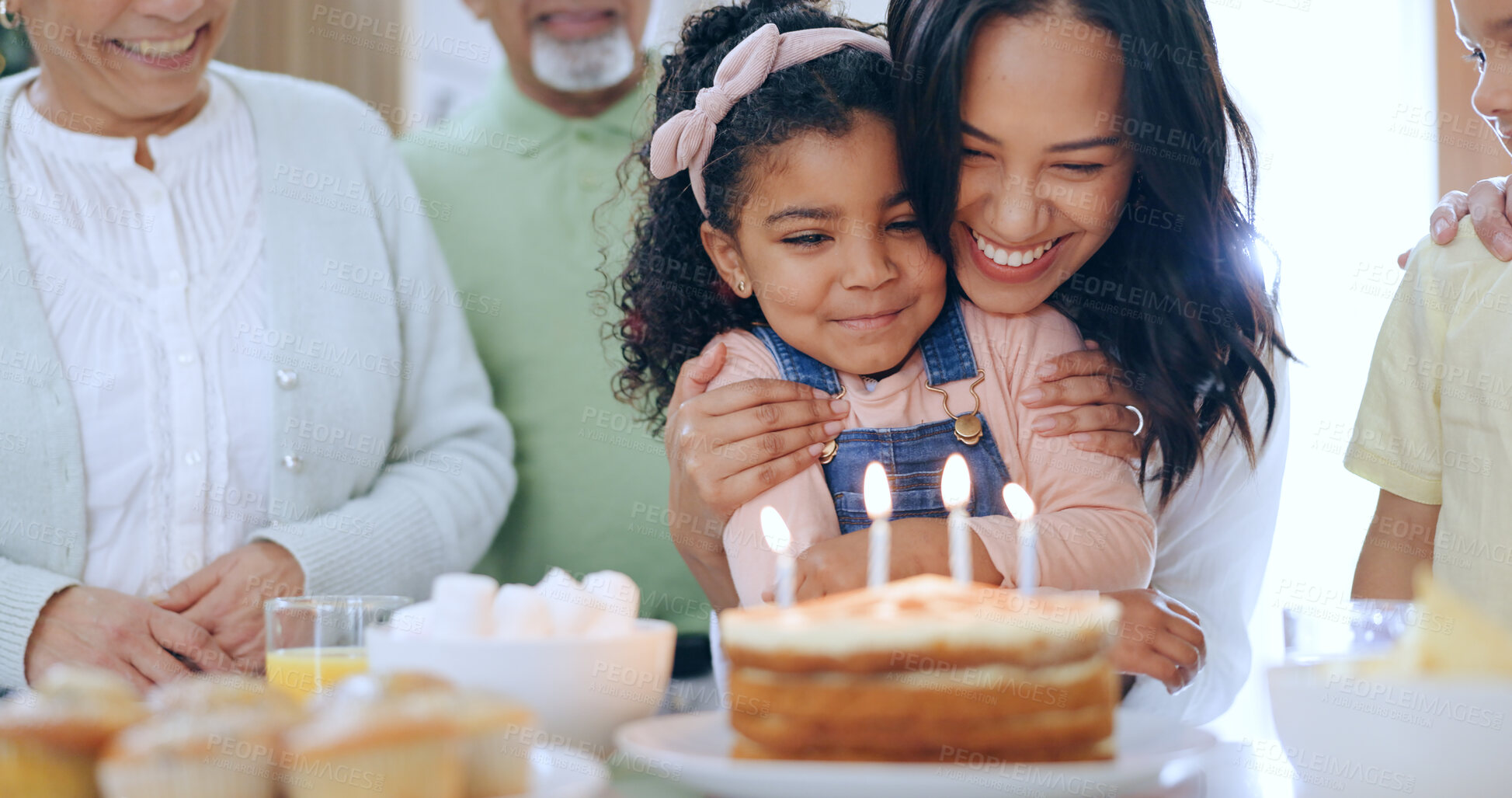 Buy stock photo Child with birthday cake, candles and family to celebrate with smile, fun and love together in home. Happiness, gift and congratulations, mom and grandparents at kids party with excited children.