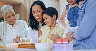 Buy stock photo Child with birthday cake, candles and big family to celebrate with smile, fun and love together in home. Happiness, gift and congratulations, mom and grandparents at kids party with excited children.