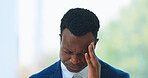Business, man or headache in office with stress, burnout or risk in corporate company from migraine. Black person, employee or entrepreneur and burnout, anxiety or discomfort from strain at workplace