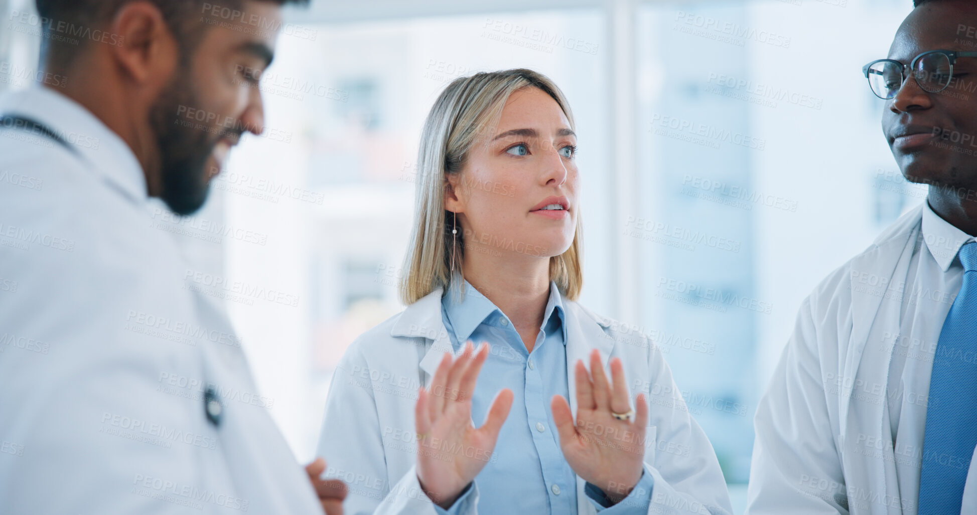 Buy stock photo Group conversation, doctors meeting or woman planning, brainstorming or collaboration in medical clinic. Communication, leader or team surgeon, nurses or expert consulting on problem solving solution