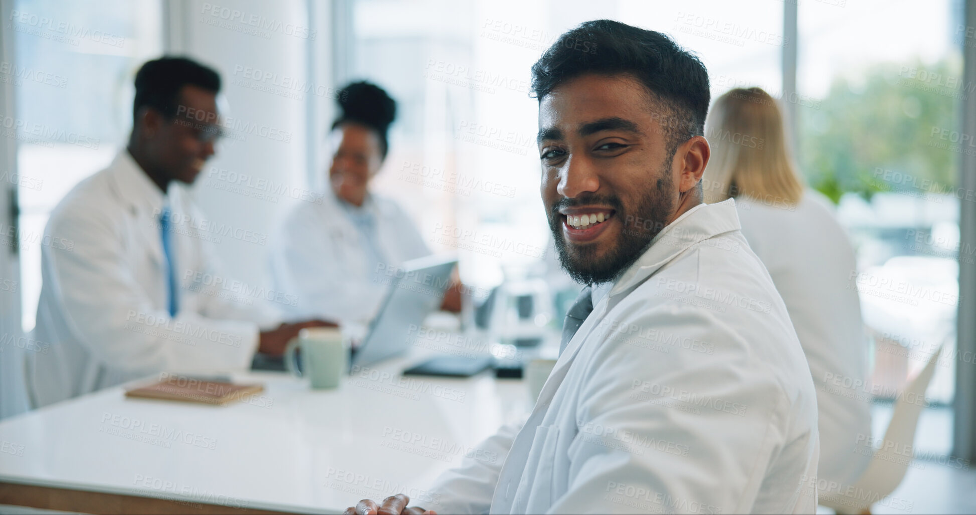 Buy stock photo Portrait, man and doctors in a meeting, smile and healthcare with planning, talking and teamwork. Face, professional and group with management staff, research and brainstorming with conversation