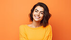 Happy, woman and portrait of a student smiling, for beauty, hair and youth or higher education. Confident, American or European female posing against an orange background in studio