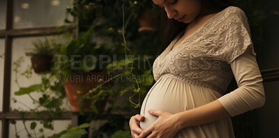 Buy stock photo Pregnant, woman and mother touching or caressing her belly while relaxing at home. Expecting, mom to be and cropped of a female rubbing her stomach and preparing for motherhood and childbirth