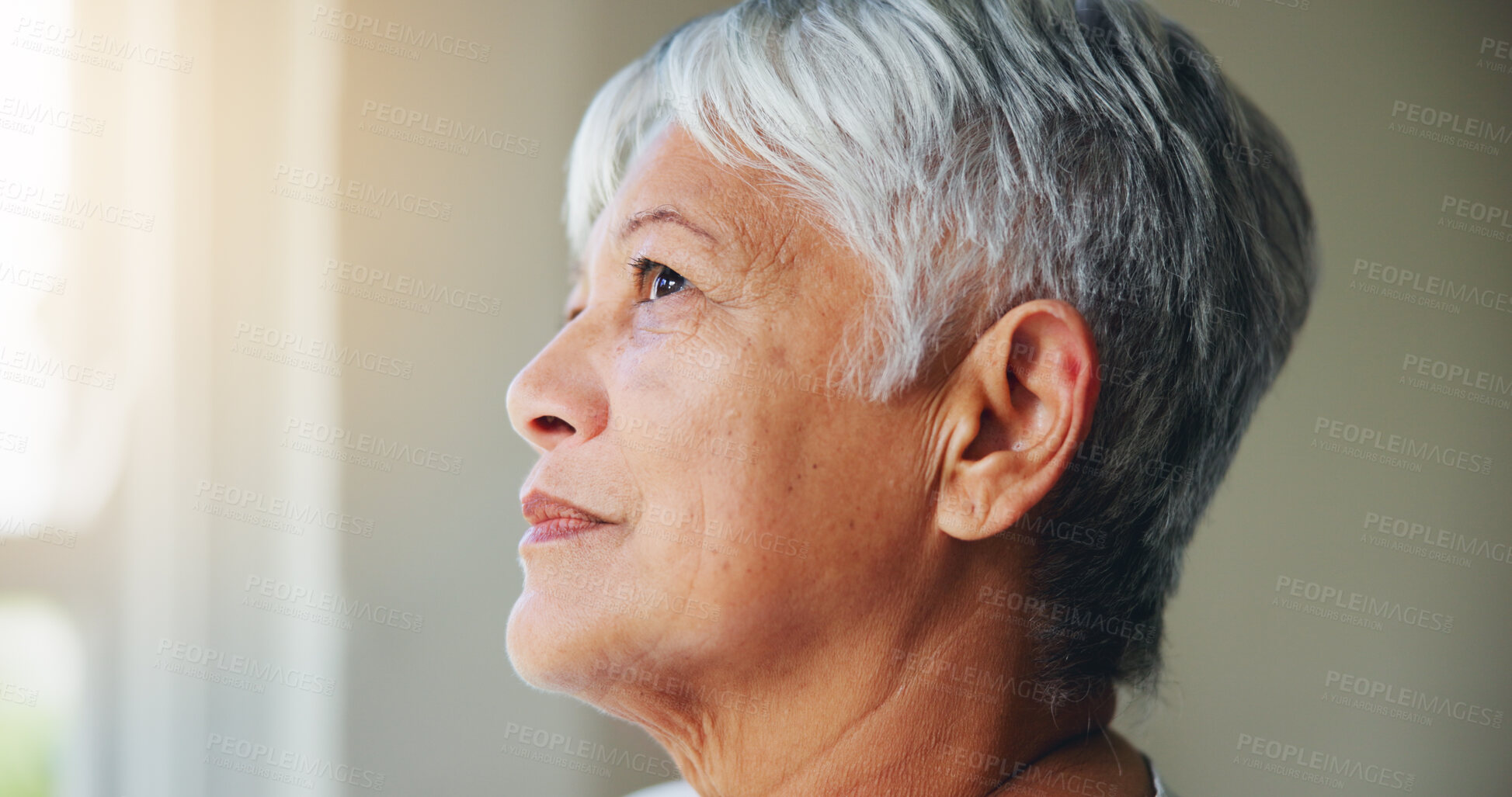 Buy stock photo Senior woman, thinking and looking out window in memory, ambition or dreaming in retirement home. Closeup or face of mature female person in wonder, contemplating or thought for idea or hope at house