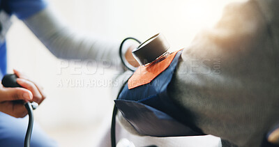 Buy stock photo Person, doctor and checking patient blood pressure for monitoring, healthcare or results at home. Closeup of medical nurse or caregiver with machine to check BPM, heart rate or examination at house