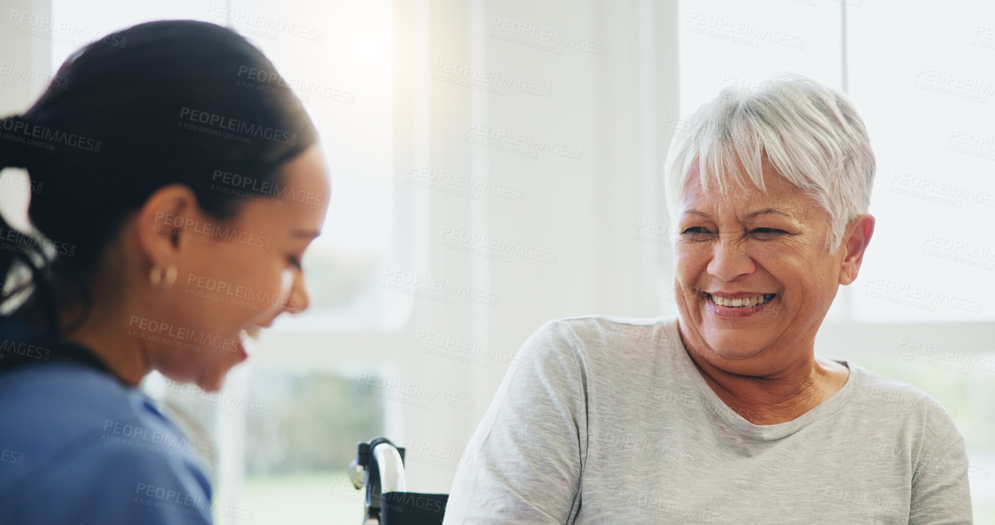 Buy stock photo Happy woman, nurse and senior patient laughing in elderly care for funny joke, humor or consultation at old age home. Doctor or medical caregiver smile and laugh with mature person with a disability