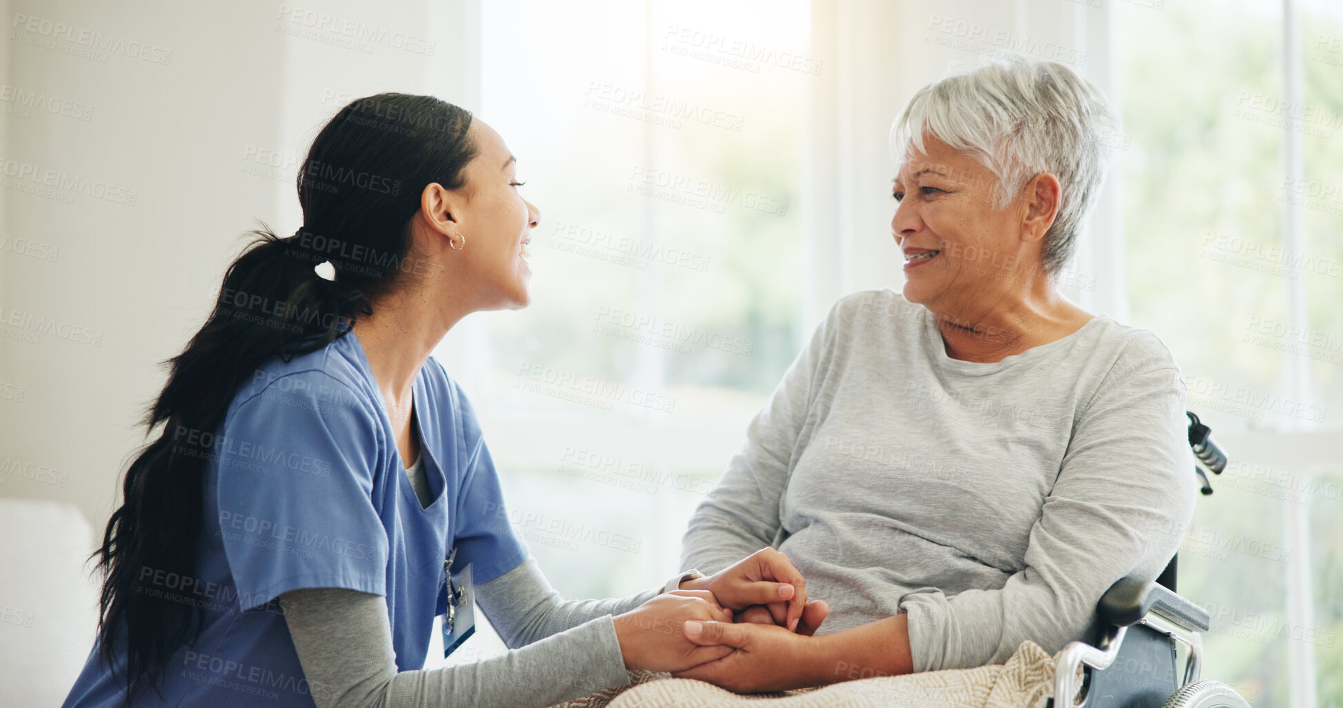 Buy stock photo Happy woman, nurse and holding hands with senior in wheelchair, support or trust for healthcare advice at home. Medical doctor, caregiver or person with a disability smile for care or help at house