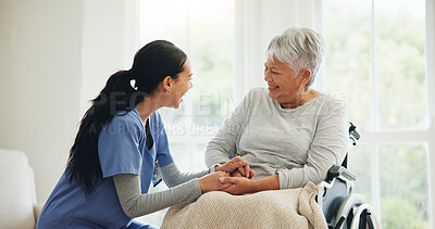 Buy stock photo Happy woman, doctor and holding hands with senior patient in wheelchair, support or trust for healthcare at home. Medical nurse, caregiver or person with a disability smile for care or help at house