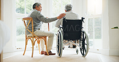 Buy stock photo Elderly man, comfort and woman in wheelchair, touch and support partner in retirement with love. Senior couple, care and hand for together in marriage, sickness and health for wellness in family home