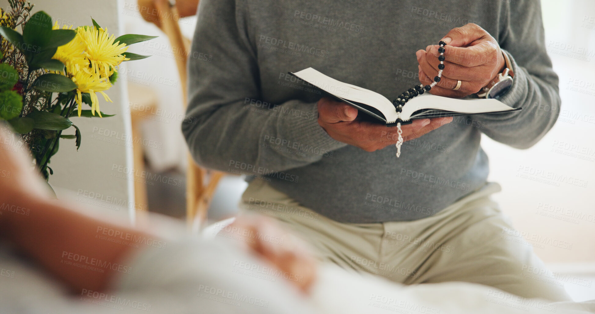 Buy stock photo Person, bible and reading for sick woman in bed or hand rosary for prayer god religion for hope, belief or support. Man, book and helping for illness or infection virus disease, recovery or faith